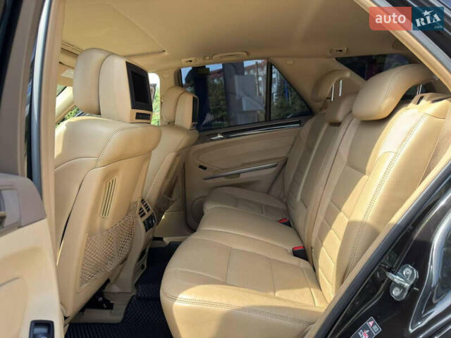 Чорний Мерседес М-Клас, об'ємом двигуна 6.3 л та пробігом 220 тис. км за 10700 $, фото 15 на Automoto.ua