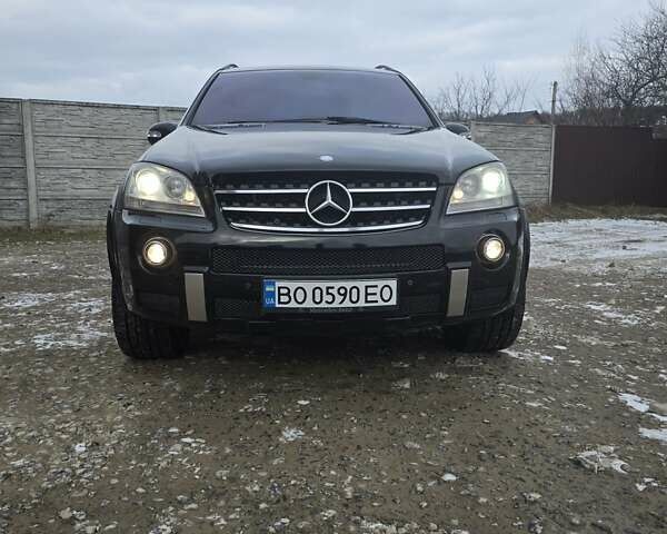 Черный Мерседес М-Класс, объемом двигателя 6.21 л и пробегом 220 тыс. км за 12000 $, фото 27 на Automoto.ua