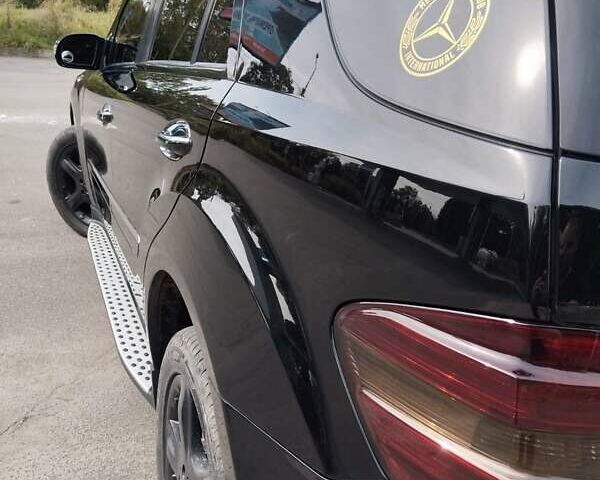 Черный Мерседес М-Класс, объемом двигателя 5.5 л и пробегом 238 тыс. км за 11300 $, фото 13 на Automoto.ua