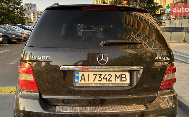 Черный Мерседес М-Класс, объемом двигателя 4.97 л и пробегом 277 тыс. км за 9500 $, фото 2 на Automoto.ua