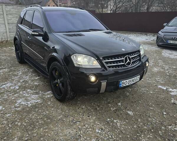 Черный Мерседес М-Класс, объемом двигателя 6.21 л и пробегом 220 тыс. км за 12000 $, фото 26 на Automoto.ua