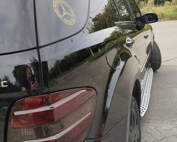 Черный Мерседес М-Класс, объемом двигателя 5.5 л и пробегом 238 тыс. км за 11300 $, фото 12 на Automoto.ua