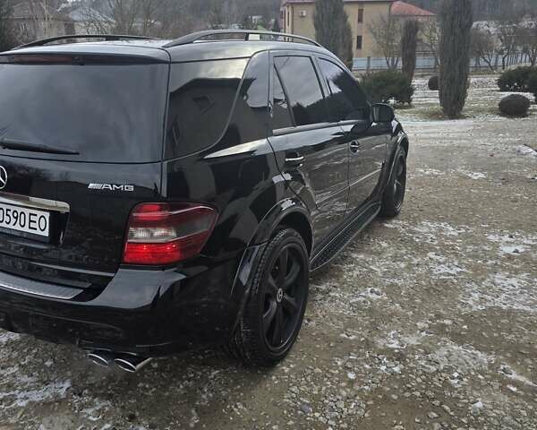 Черный Мерседес М-Класс, объемом двигателя 6.21 л и пробегом 220 тыс. км за 12000 $, фото 29 на Automoto.ua