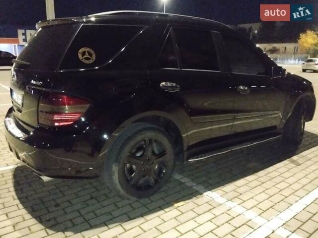 Черный Мерседес М-Класс, объемом двигателя 5.5 л и пробегом 238 тыс. км за 11300 $, фото 20 на Automoto.ua