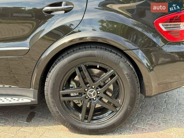 Чорний Мерседес М-Клас, об'ємом двигуна 6.3 л та пробігом 220 тис. км за 10700 $, фото 6 на Automoto.ua