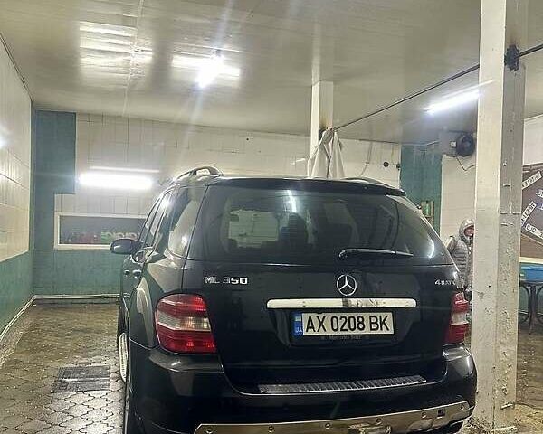 Черный Мерседес М-Класс, объемом двигателя 3.5 л и пробегом 241 тыс. км за 9800 $, фото 2 на Automoto.ua