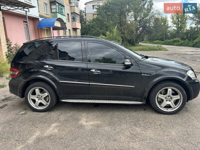 Черный Мерседес М-Класс, объемом двигателя 6.3 л и пробегом 148 тыс. км за 12500 $, фото 3 на Automoto.ua