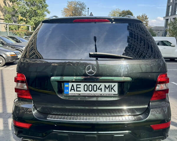 Черный Мерседес М-Класс, объемом двигателя 6.21 л и пробегом 174 тыс. км за 18999 $, фото 5 на Automoto.ua