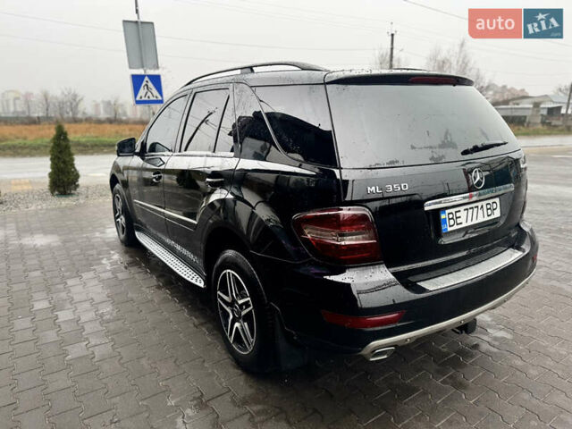 Черный Мерседес М-Класс, объемом двигателя 3.5 л и пробегом 196 тыс. км за 15000 $, фото 47 на Automoto.ua