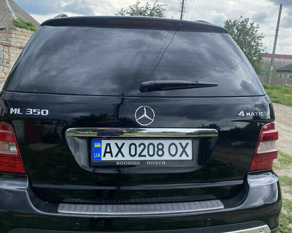 Черный Мерседес М-Класс, объемом двигателя 3.5 л и пробегом 295 тыс. км за 10000 $, фото 2 на Automoto.ua