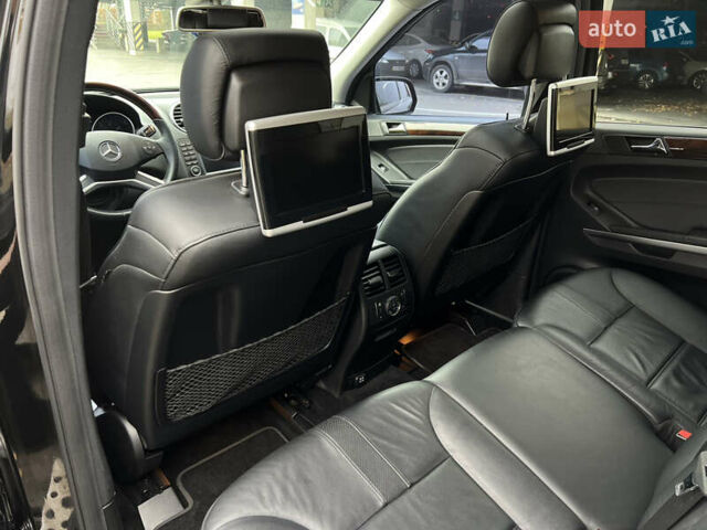 Черный Мерседес М-Класс, объемом двигателя 3.5 л и пробегом 265 тыс. км за 14300 $, фото 45 на Automoto.ua