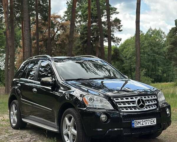Черный Мерседес М-Класс, объемом двигателя 5.5 л и пробегом 255 тыс. км за 12000 $, фото 33 на Automoto.ua