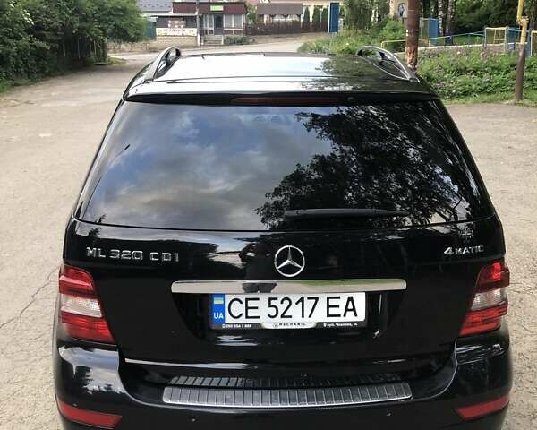 Черный Мерседес М-Класс, объемом двигателя 6.21 л и пробегом 281 тыс. км за 14300 $, фото 7 на Automoto.ua