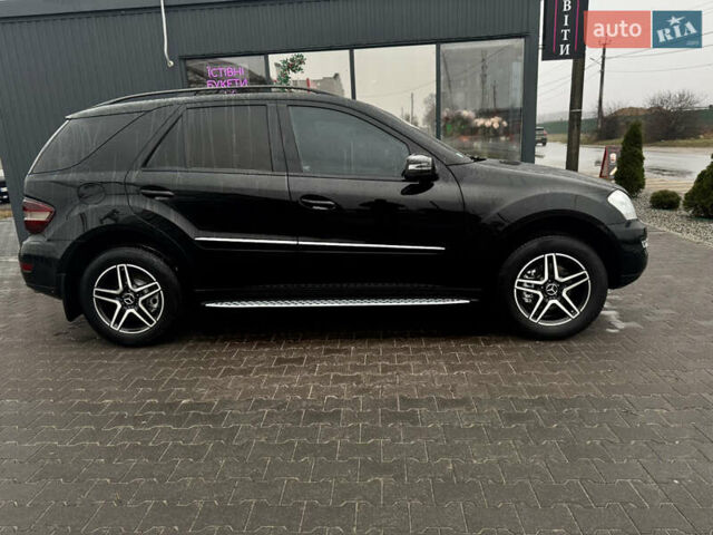 Черный Мерседес М-Класс, объемом двигателя 3.5 л и пробегом 196 тыс. км за 15000 $, фото 50 на Automoto.ua