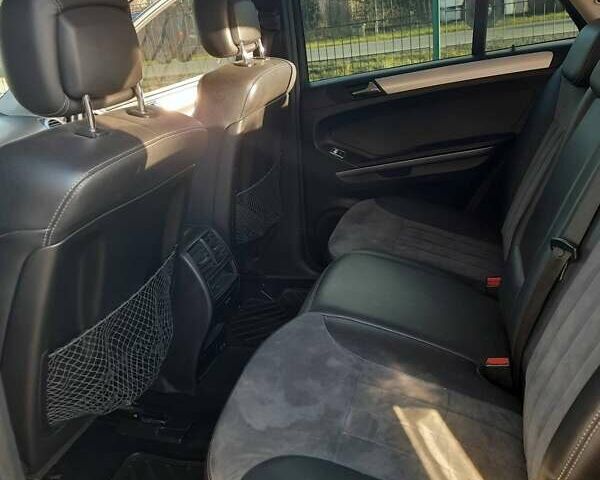 Черный Мерседес М-Класс, объемом двигателя 3 л и пробегом 319 тыс. км за 14000 $, фото 3 на Automoto.ua