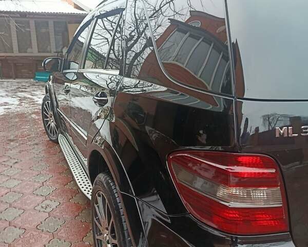 Чорний Мерседес М-Клас, об'ємом двигуна 2.99 л та пробігом 233 тис. км за 12800 $, фото 3 на Automoto.ua