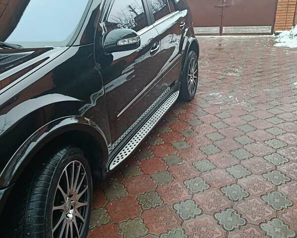 Чорний Мерседес М-Клас, об'ємом двигуна 2.99 л та пробігом 233 тис. км за 12800 $, фото 4 на Automoto.ua