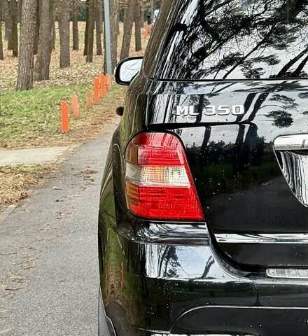 Черный Мерседес М-Класс, объемом двигателя 3.5 л и пробегом 174 тыс. км за 10999 $, фото 15 на Automoto.ua