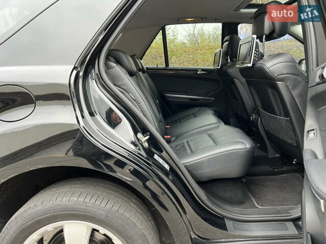 Черный Мерседес М-Класс, объемом двигателя 3.5 л и пробегом 265 тыс. км за 14300 $, фото 61 на Automoto.ua