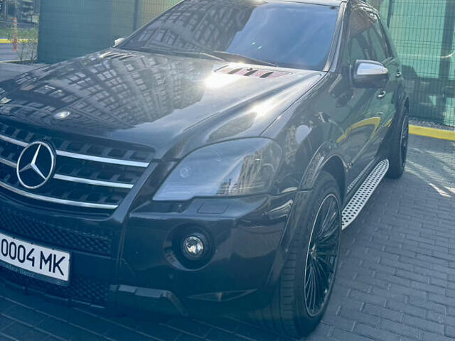 Черный Мерседес М-Класс, объемом двигателя 6.21 л и пробегом 174 тыс. км за 18999 $, фото 1 на Automoto.ua