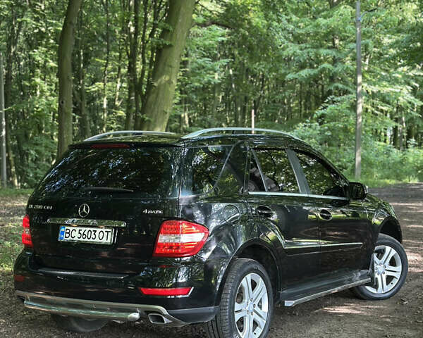 Чорний Мерседес М-Клас, об'ємом двигуна 3 л та пробігом 325 тис. км за 13000 $, фото 3 на Automoto.ua