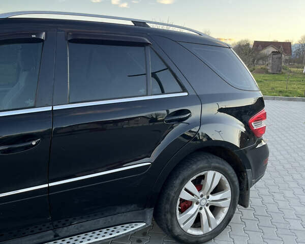 Чорний Мерседес М-Клас, об'ємом двигуна 2.99 л та пробігом 199 тис. км за 16399 $, фото 18 на Automoto.ua