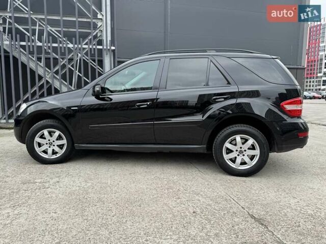 Чорний Мерседес М-Клас, об'ємом двигуна 3 л та пробігом 307 тис. км за 14750 $, фото 6 на Automoto.ua