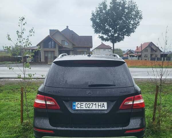 Чорний Мерседес М-Клас, об'ємом двигуна 2.99 л та пробігом 252 тис. км за 18500 $, фото 2 на Automoto.ua