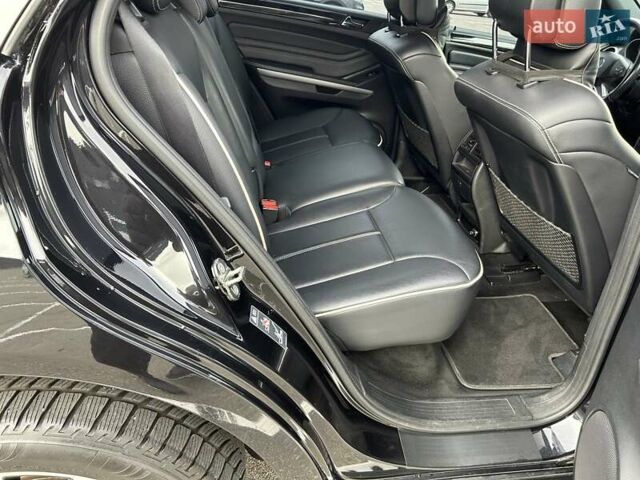 Черный Мерседес М-Класс, объемом двигателя 3.5 л и пробегом 128 тыс. км за 15200 $, фото 23 на Automoto.ua