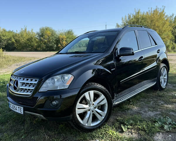 Черный Мерседес М-Класс, объемом двигателя 6.21 л и пробегом 286 тыс. км за 16500 $, фото 19 на Automoto.ua