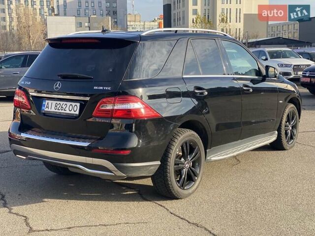 Черный Мерседес М-Класс, объемом двигателя 3 л и пробегом 145 тыс. км за 19990 $, фото 5 на Automoto.ua