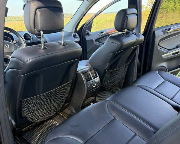 Черный Мерседес М-Класс, объемом двигателя 6.21 л и пробегом 286 тыс. км за 16500 $, фото 9 на Automoto.ua