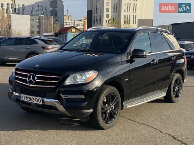 Черный Мерседес М-Класс, объемом двигателя 3 л и пробегом 145 тыс. км за 19990 $, фото 2 на Automoto.ua