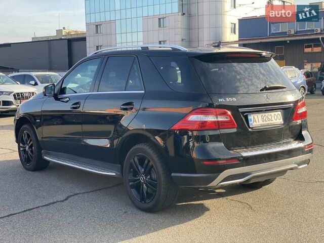 Черный Мерседес М-Класс, объемом двигателя 3 л и пробегом 145 тыс. км за 19990 $, фото 3 на Automoto.ua