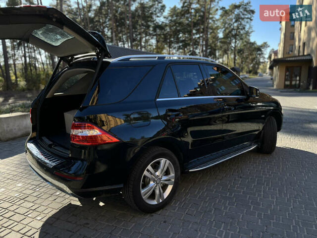 Черный Мерседес М-Класс, объемом двигателя 3 л и пробегом 260 тыс. км за 20500 $, фото 19 на Automoto.ua