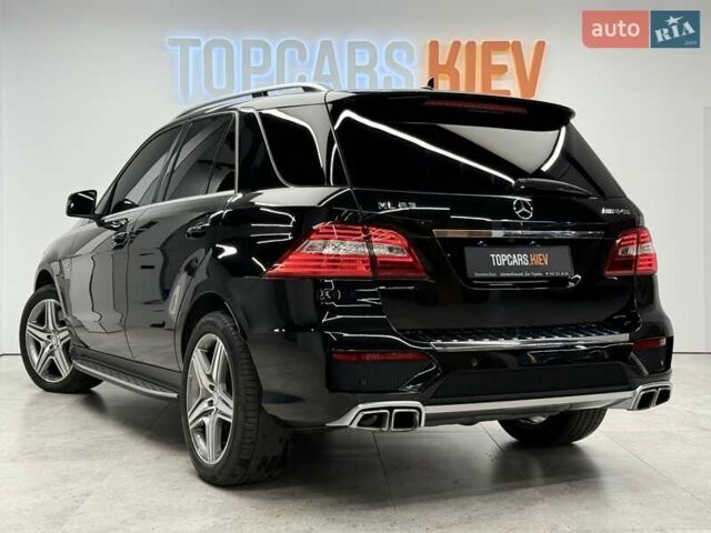 Черный Мерседес М-Класс, объемом двигателя 5.46 л и пробегом 119 тыс. км за 32990 $, фото 10 на Automoto.ua