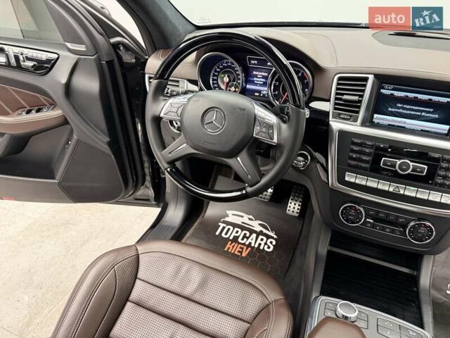 Черный Мерседес М-Класс, объемом двигателя 5.46 л и пробегом 119 тыс. км за 32990 $, фото 44 на Automoto.ua