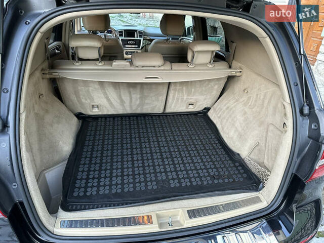 Черный Мерседес М-Класс, объемом двигателя 2.14 л и пробегом 247 тыс. км за 20500 $, фото 48 на Automoto.ua