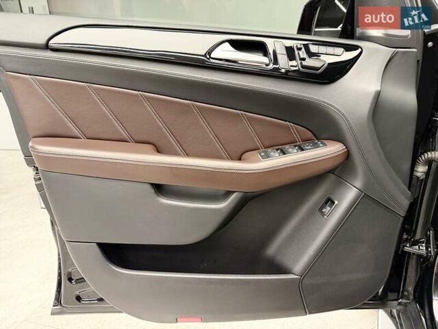 Черный Мерседес М-Класс, объемом двигателя 5.46 л и пробегом 119 тыс. км за 32990 $, фото 18 на Automoto.ua