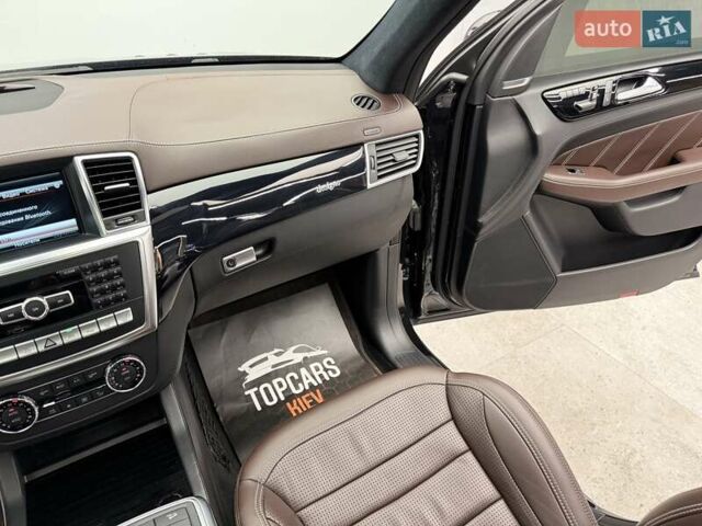 Черный Мерседес М-Класс, объемом двигателя 5.46 л и пробегом 119 тыс. км за 32990 $, фото 46 на Automoto.ua