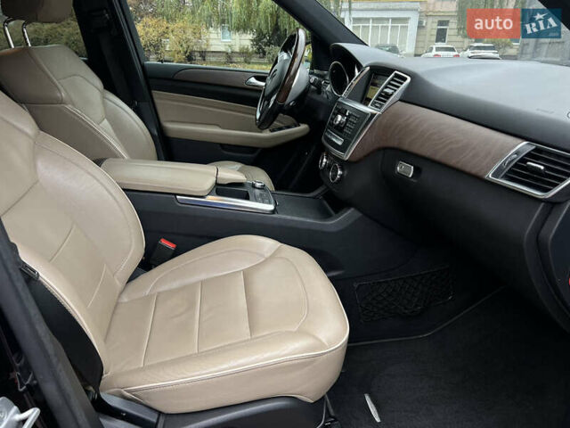 Мерседес М-Класс 2012 в Киеве на Automoto.ua Черный Мерседес М-Класс, объемом двигателя 3.5 л и пробегом 160 тыс. км за 17900 $, фото 28 на Automoto.ua