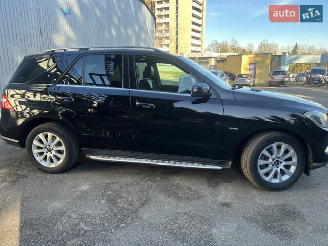 Черный Мерседес М-Класс, объемом двигателя 2.14 л и пробегом 198 тыс. км за 21700 $, фото 1 на Automoto.ua