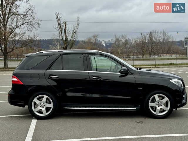 Черный Мерседес М-Класс, объемом двигателя 3.5 л и пробегом 160 тыс. км за 19500 $, фото 4 на Automoto.ua