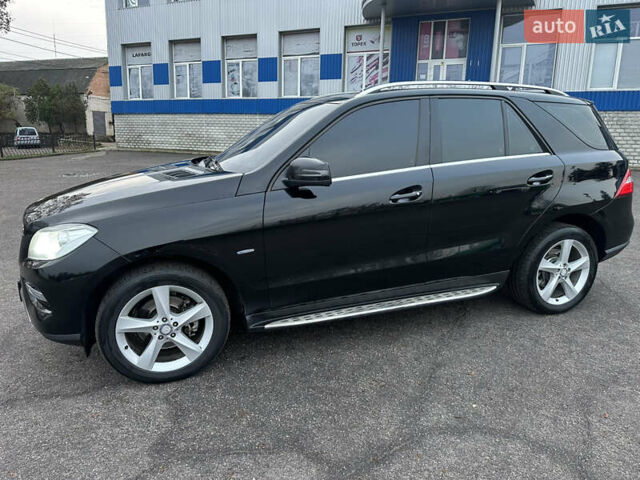 Чорний Мерседес М-Клас, об'ємом двигуна 2.14 л та пробігом 220 тис. км за 18500 $, фото 4 на Automoto.ua