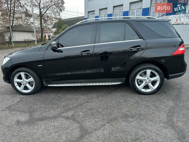 Чорний Мерседес М-Клас, об'ємом двигуна 2.14 л та пробігом 220 тис. км за 18500 $, фото 5 на Automoto.ua