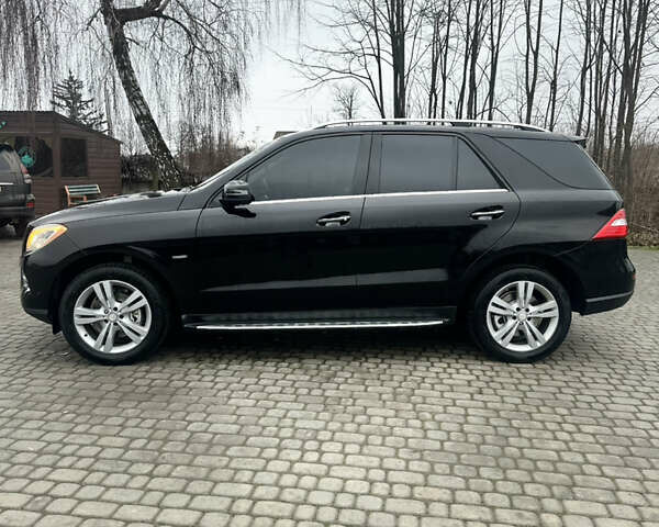 Черный Мерседес М-Класс, объемом двигателя 3.5 л и пробегом 203 тыс. км за 18500 $, фото 1 на Automoto.ua