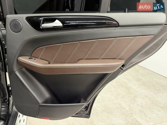 Черный Мерседес М-Класс, объемом двигателя 5.46 л и пробегом 119 тыс. км за 32990 $, фото 29 на Automoto.ua