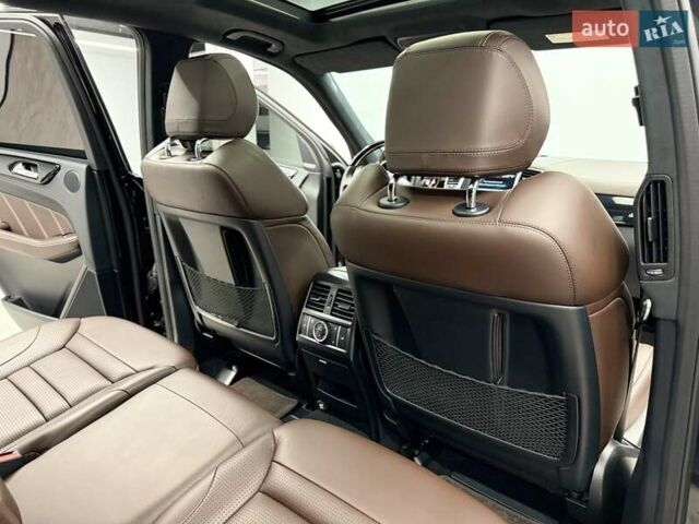 Черный Мерседес М-Класс, объемом двигателя 5.46 л и пробегом 119 тыс. км за 32990 $, фото 30 на Automoto.ua