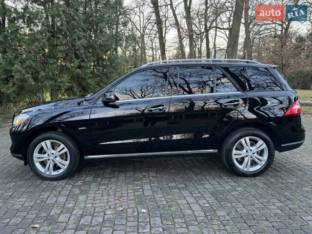 Черный Мерседес М-Класс, объемом двигателя 3 л и пробегом 274 тыс. км за 19700 $, фото 4 на Automoto.ua