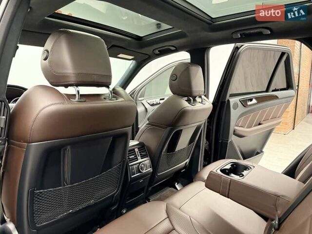 Черный Мерседес М-Класс, объемом двигателя 5.46 л и пробегом 119 тыс. км за 32990 $, фото 25 на Automoto.ua